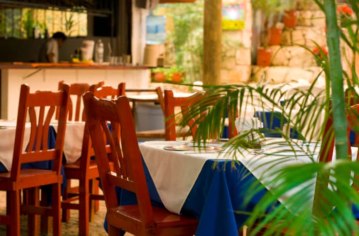 Restaurant in Cozumel / nashvilledino2/iStock