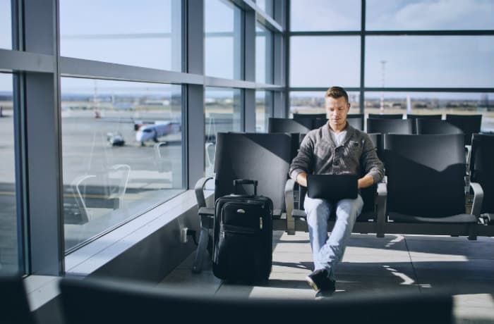 Passenger at gate / Chalabala/iStock